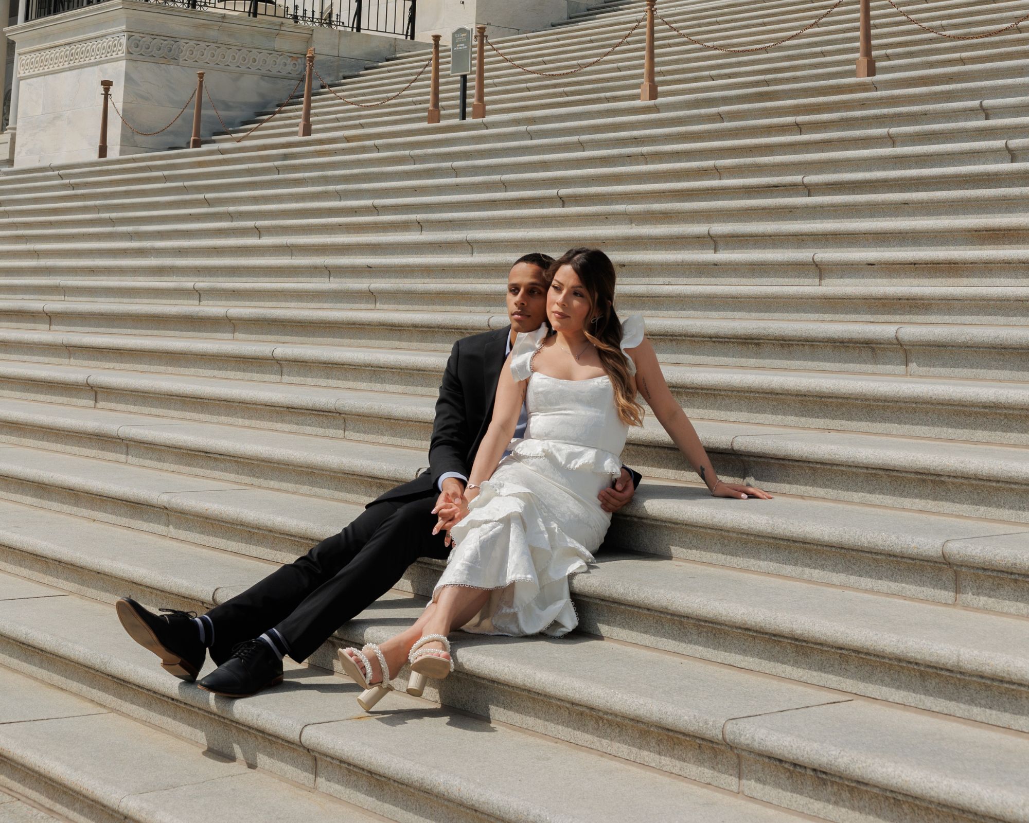 Couple posing on steps