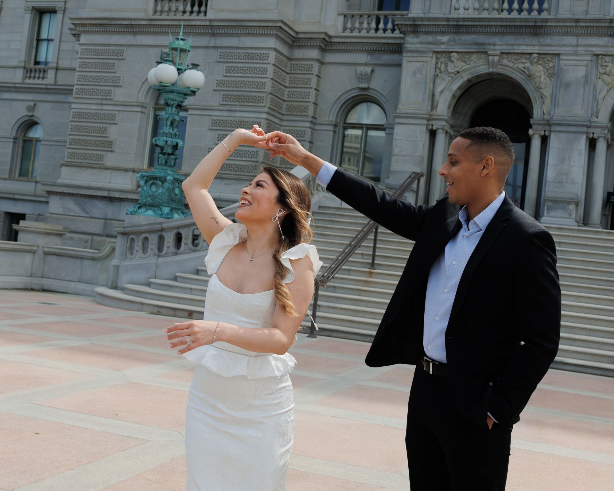 Happy couple dancing together in Washington DC.