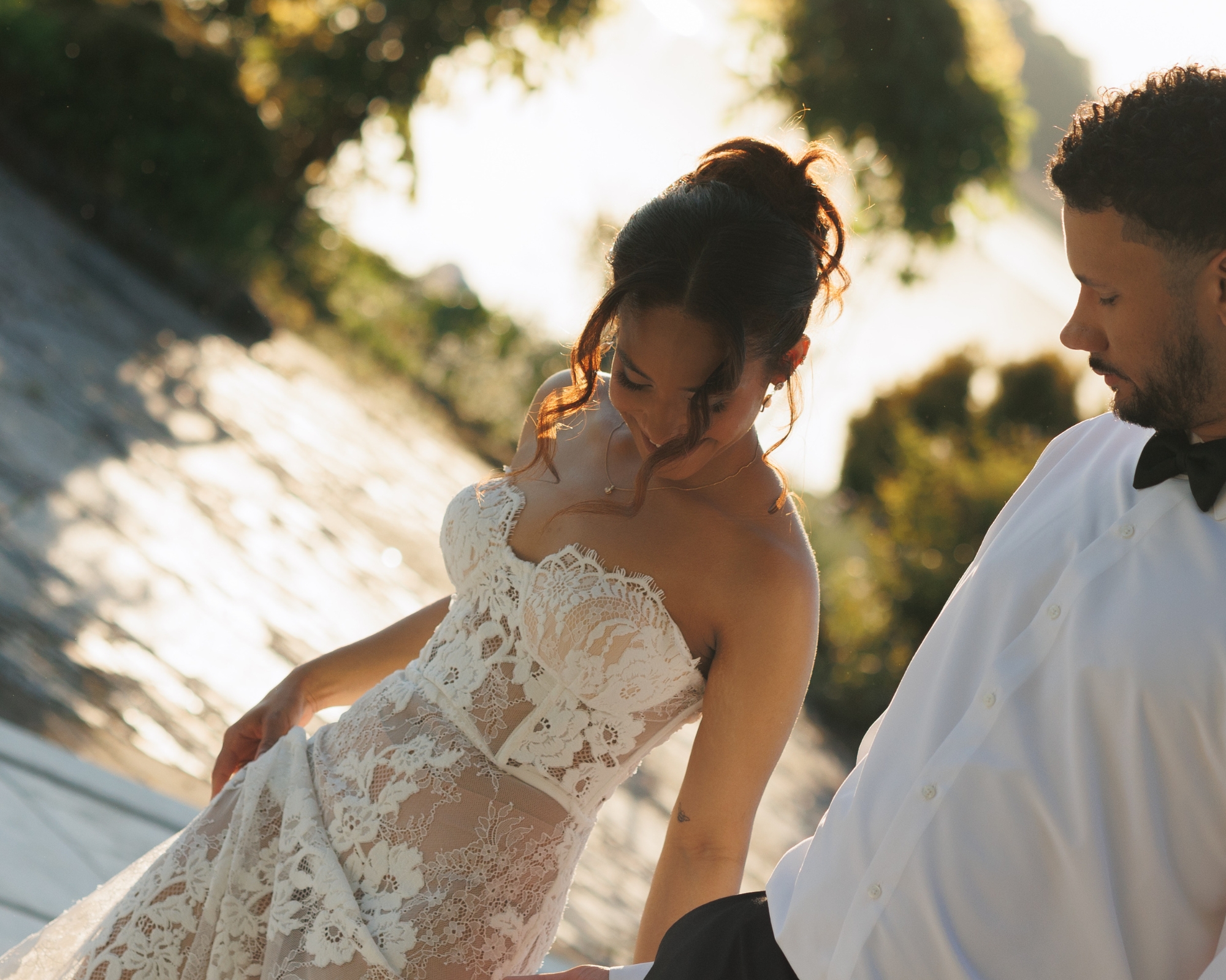 The bride looks elegant in her reception dress.