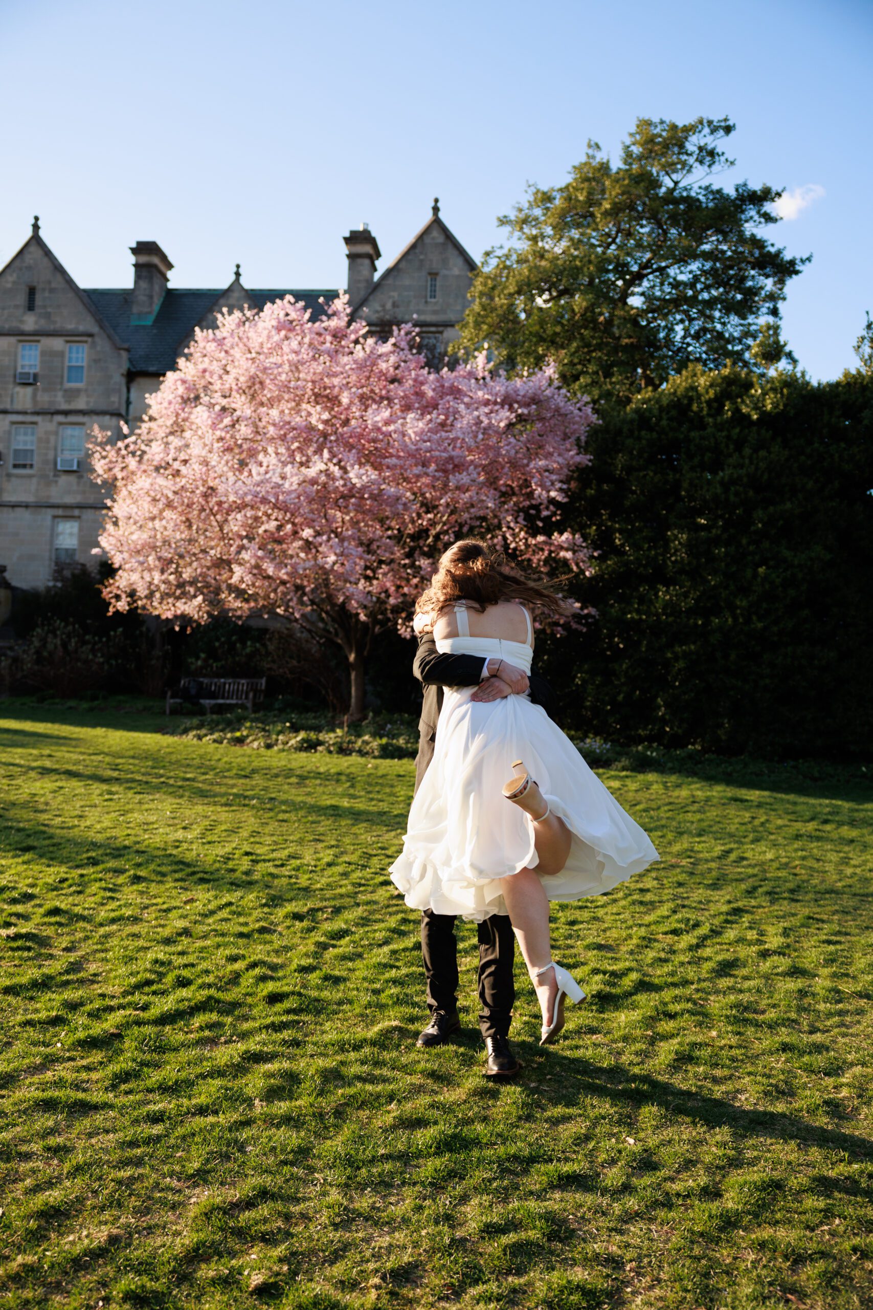 Couple spins around during their fun engagement session.