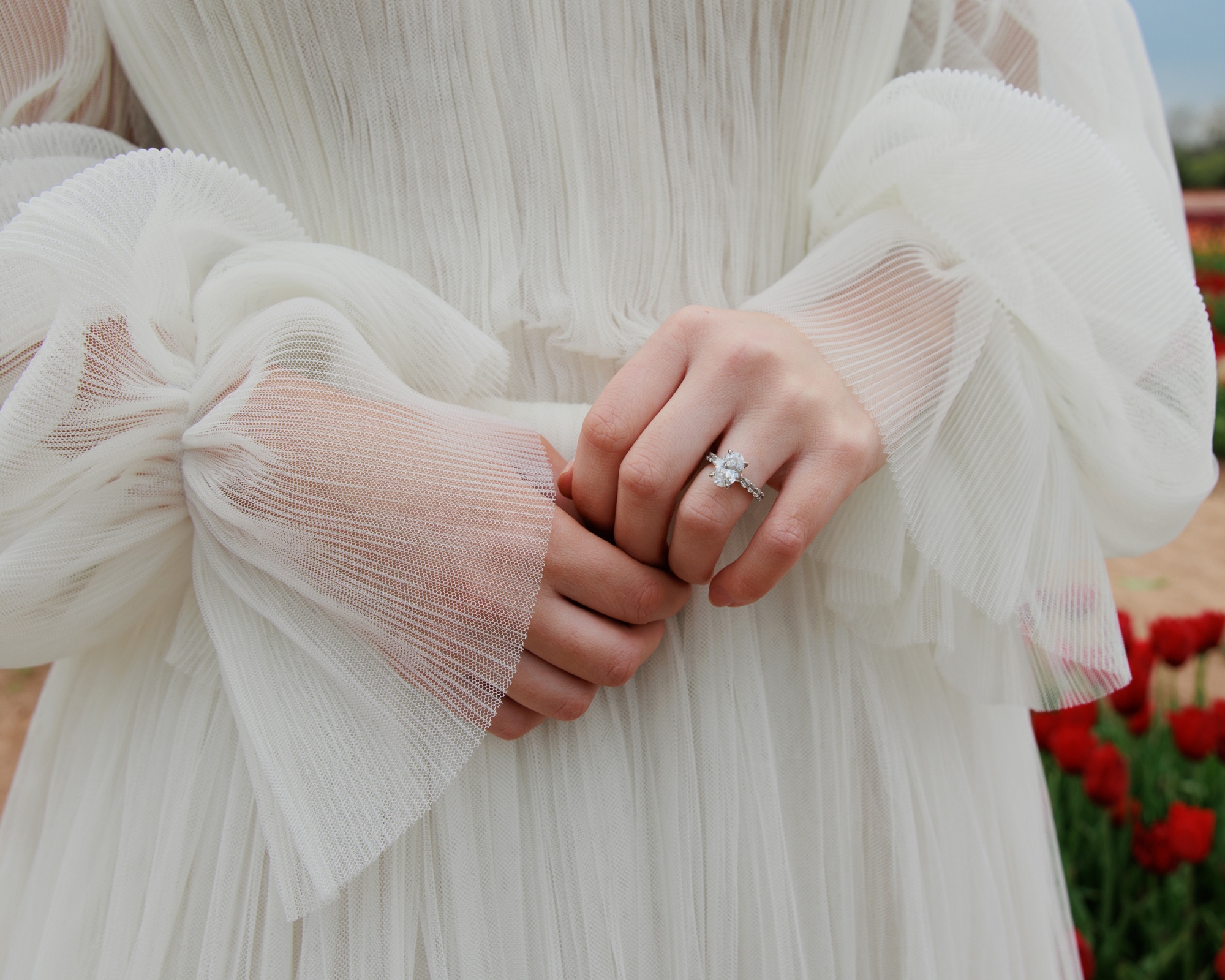 Bride showcasing her engagement ring