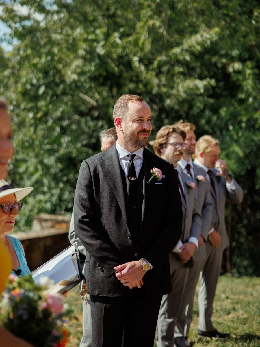 Groom waiting for his bride at the ceremony