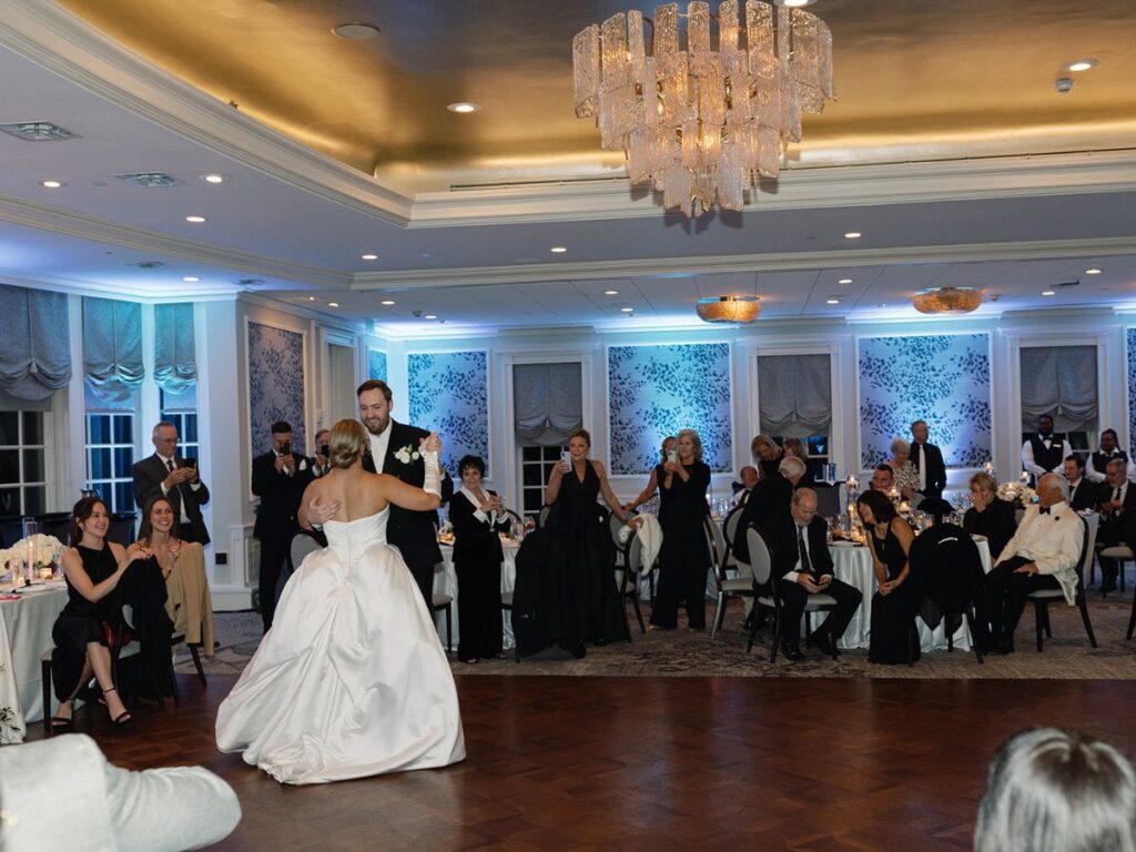 Bride and groom sharing their first dance together.