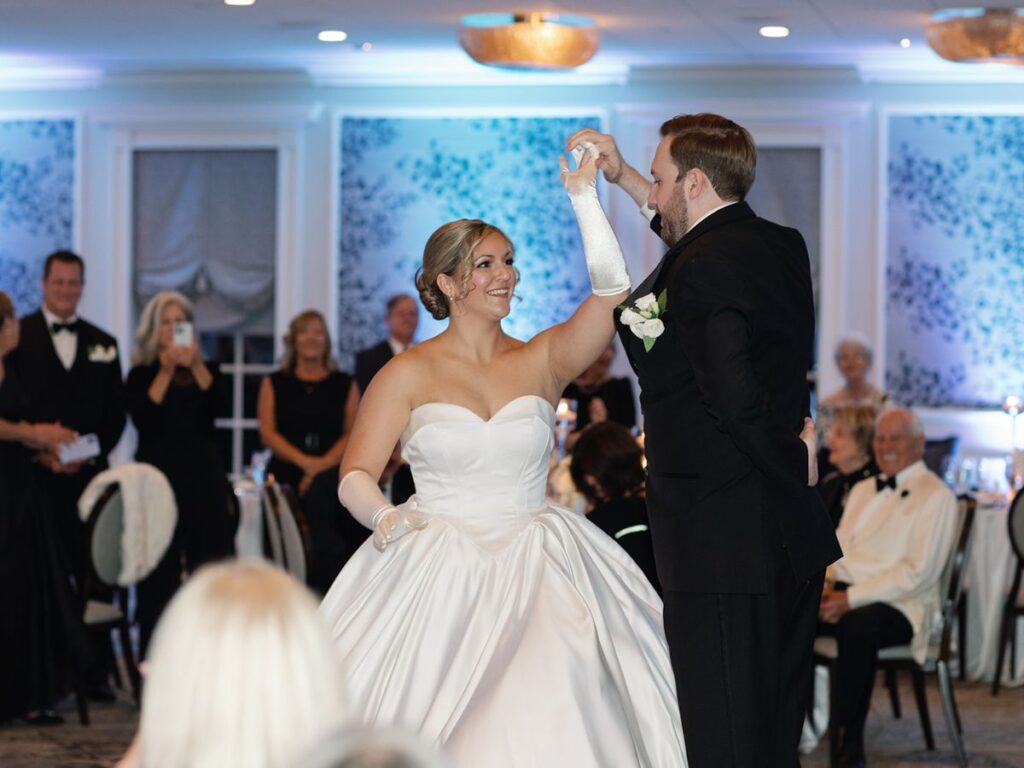 Bride and groom sharing their first dance together.