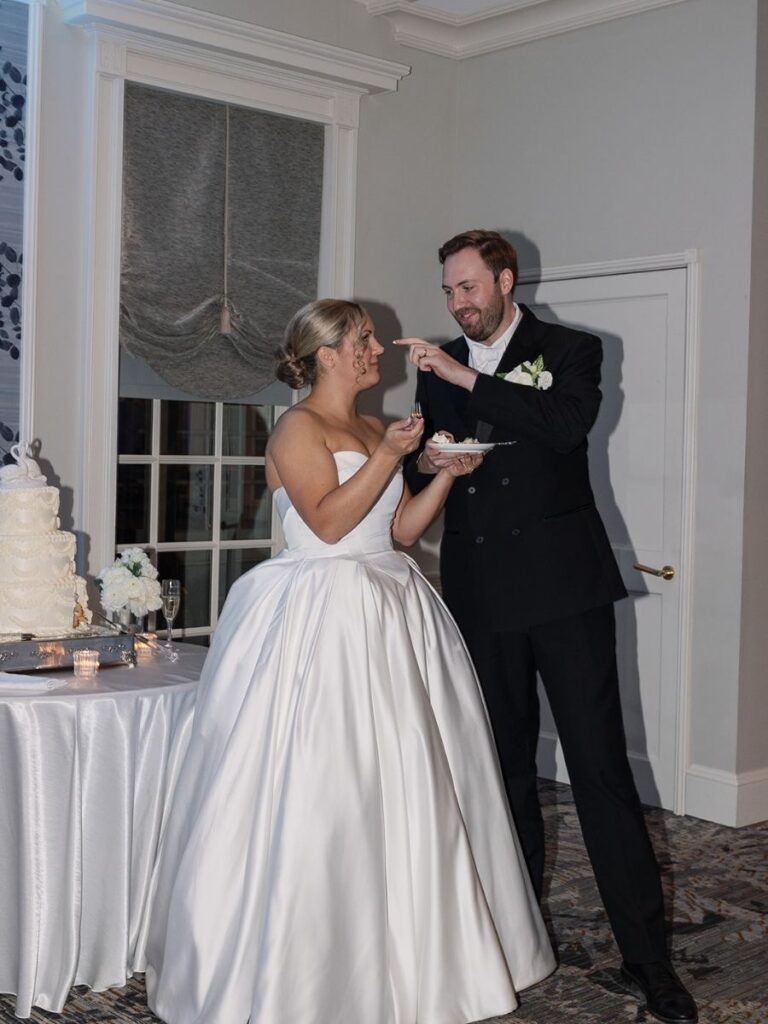 Bride and groom enjoying their wedding reception.