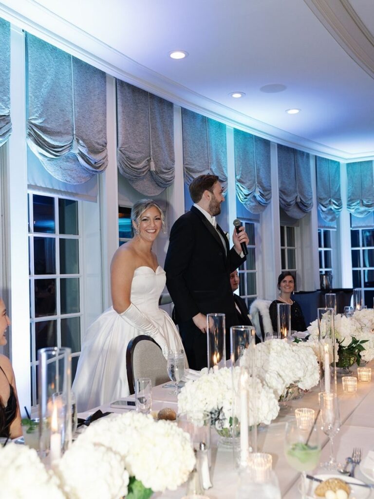 Bride and groom enjoying their wedding reception.