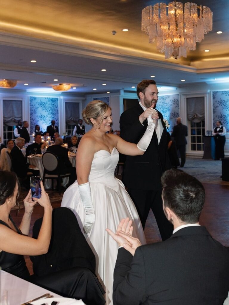 Bride and groom enjoying their wedding reception.